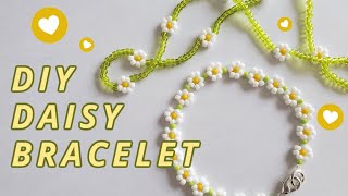 How to make a DAISY CHAIN flower bracelet  Easy beaded 90s jewelry DIY [upl. by Ellebyam329]